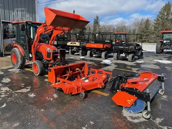 2018 B2650 Cab Tractor with Front Mount Blower and Broom, and Mid-Mount Mower