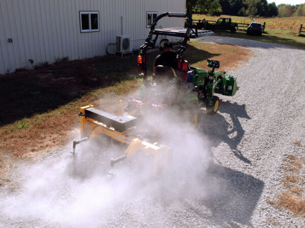 Nortec Raptor Compact Power Rake on Gravel Drive