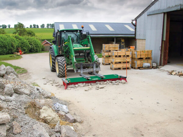 Sweeping Concrete and Rocks with Broomex BM C-Max